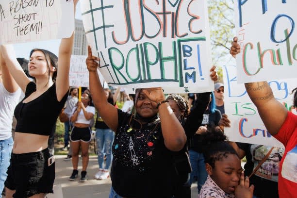 Protesters attend a rally for Black teen Ralph Yarl in front of US District Court on 18 April 2023 in Kansas City, Missouri (Getty Images)