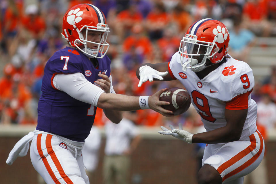 Apr 6, 2019; Clemson, SC, USA; Clemson Tigers quarterback Chase Brice hands the ball off to running back Travis Etienne (9) during the first half of the spring game at Clemson Memorial Stadium. Mandatory Credit: Joshua S. Kelly-USA TODAY Sports