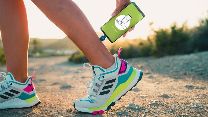 <span class="article__caption">A woman uses the device to zap a mosquito bite on her leg.</span> (Photo: Courtesy Heat It)