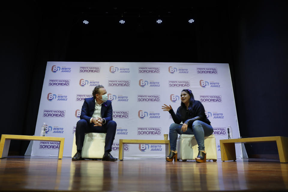 Olimpia Coral Melo, right, who became an activist against online sexual harassment and assault after a video of her having sex was published online in 2013, speaks with Benito Juarez borough Mayor Santiago Taboada, during a live broadcast in Mexico City, Monday, Nov. 23, 2020. Melo's story and subsequent activism have led to the creation of numerous state laws against cyber violence, and Mexico's government is on the verge of passing a federal version of "Olimpia's Law." (AP Photo/Rebecca Blackwell)