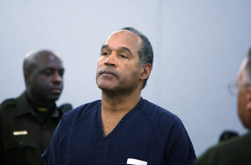 LAS VEGAS - DECEMBER 5: O.J. Simpson Simpson stands in the courtroom after being sentenced at the Clark County Regional Justice Center December 5, 2008 in Las Vegas, Nevada. Simpson and co-defendant Clarence “C.J.” Stewart were sentenced on 12 charges, including felony kidnapping, armed robbery and conspiracy related to a 2007 confrontation with sports memorabilia dealers in a Las Vegas hotel. - Photo: Issac Brekken-Pool (Getty Images)