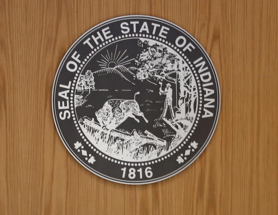 The Indiana state seal marks the bench in a courtroom Friday, March 11, 2022 at the new Marion County Courthouse on the Community Justice Campus.