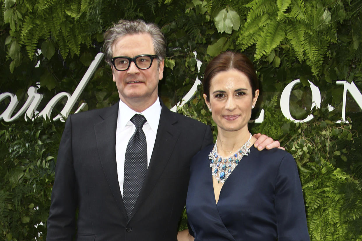 Actor Colin Firth, left, and Livia Firth pose for photographers upon arrival at the Chopard store launch in London, Monday, June 17, 2019. (Photo by Joel C Ryan/Invision/AP)