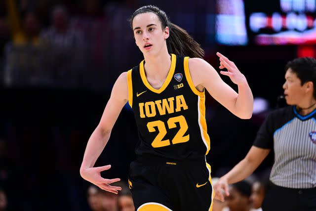 <p>Ben Solomon/NCAA Photos via Getty</p> Caitlin Clark playing at the 2024 NCAA Women's final