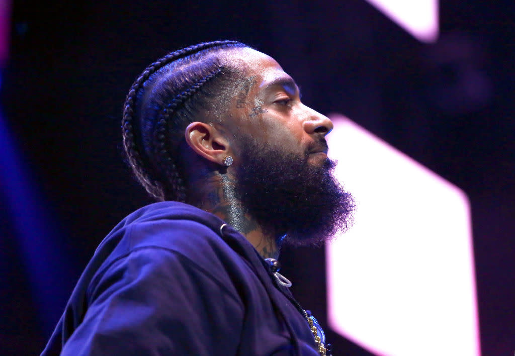 Check out these 30 Nipsey Hussle Quotes. Pictured: side profile of Nipsey Hussle. | (Photo by Ser Baffo/Getty Images for BET)