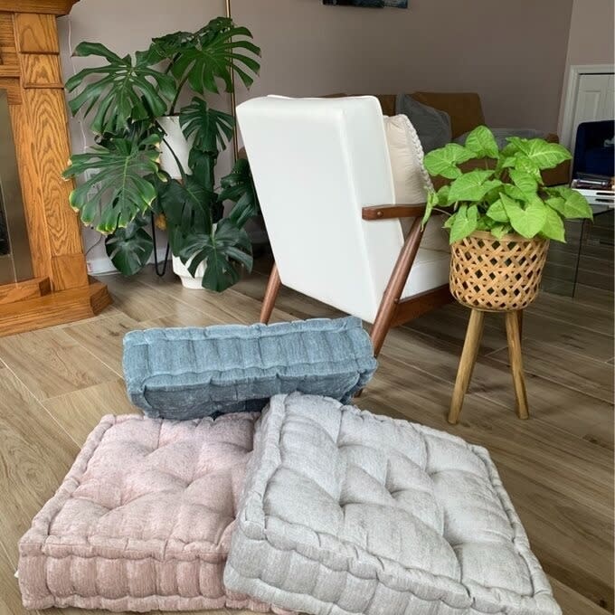 three of the pillows in a reviewer's room