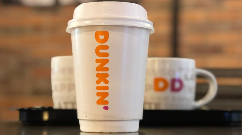Closeup of a Dunkin' coffee cup