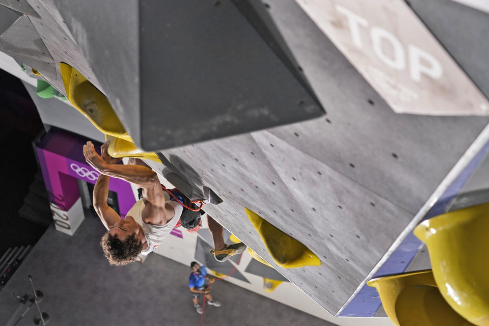 Adam Ondra, of the Czech Republic, participates during the lead qualification portion of the men's sport climbing competition at the 2020 Summer Olympics, Tuesday, Aug. 3, 2021, in Tokyo, Japan. (AP Photo/Jeff Roberson, POOL)