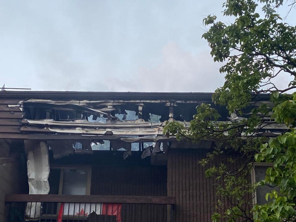 Damage to the roof of the 120-unit building at 99 McNaugton Ave. West in Chatham.