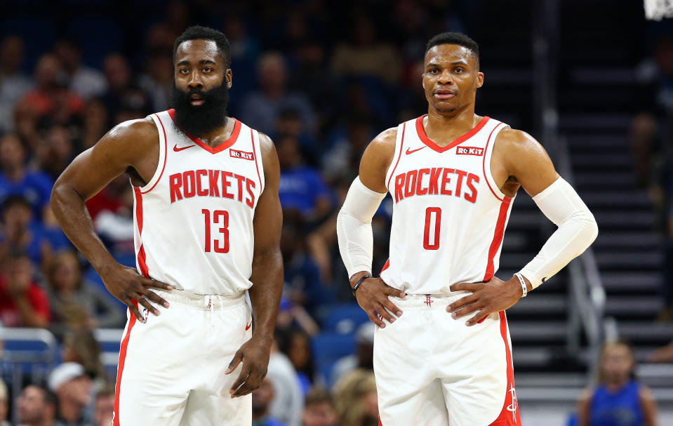 Dec 13, 2019; Orlando, FL, USA; Houston Rockets guard Russell Westbrook (0)  and Houston Rockets guard James Harden (13) look on against the Orlando Magic during the first quarter at Amway Center. Mandatory Credit: Kim Klement-USA TODAY Sports