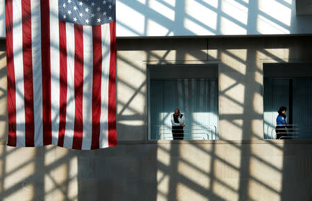 People are seen inside the Bulova Corporate Center which houses the local Transportation Security Administration (TSA) offices where TSA employees are working without pay in the Queens borough of New York City, New York, U.S., January 22, 2019. REUTERS/Mike Segar