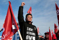 Unifor National President Jerry Dias greets General Motors assembly workers protesting GM's announcement to close its Oshawa assembly plant during a rally across the Detroit River from GM's headquarters, in Windsor, Ontario, Canada January 11, 2019. REUTERS/Rebecca Cook