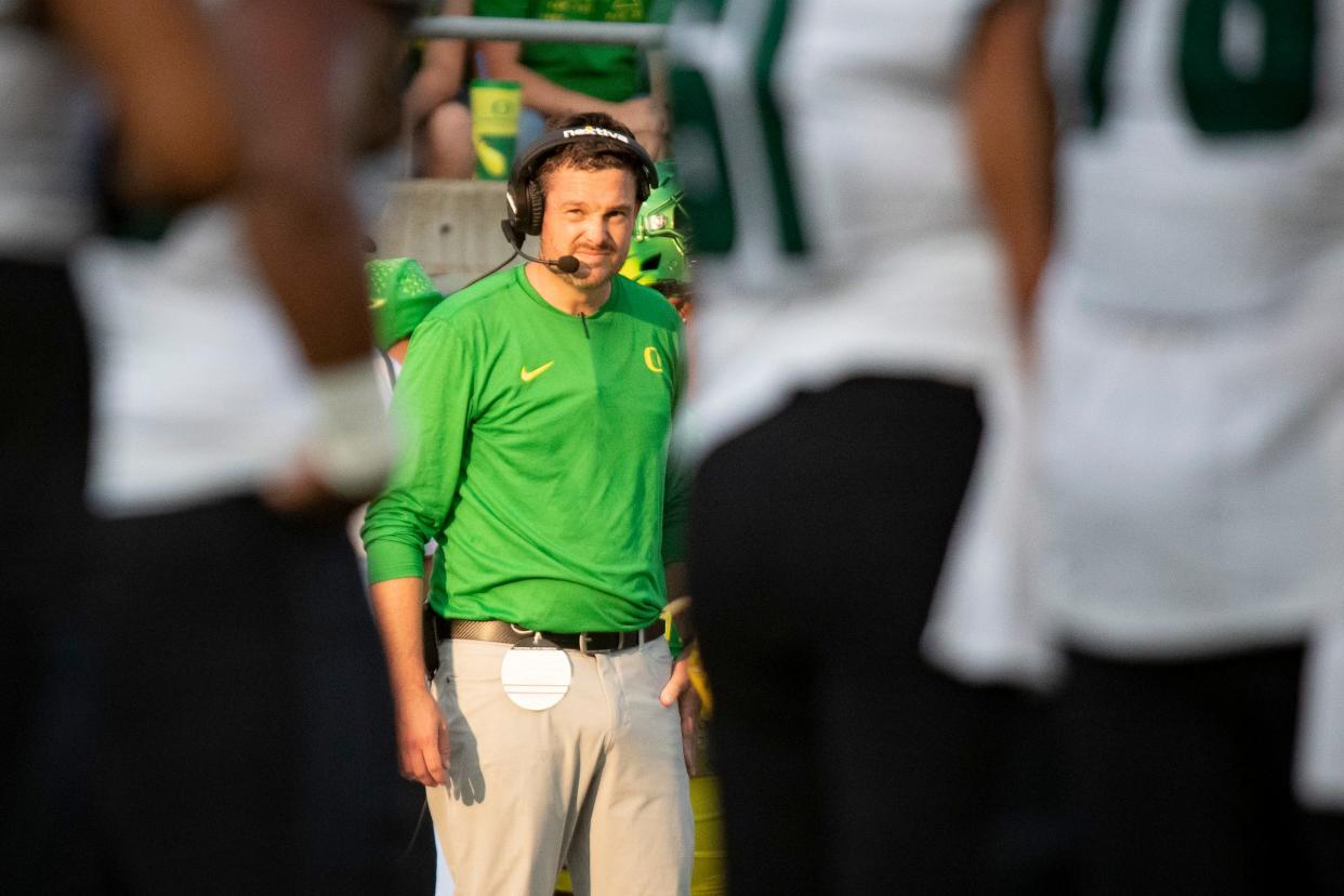 Oregon head coach Dan Lanning watches from the sideline as the Oregon Ducks host Hawaii on Sept. 16 at Hayward Field in Eugene.