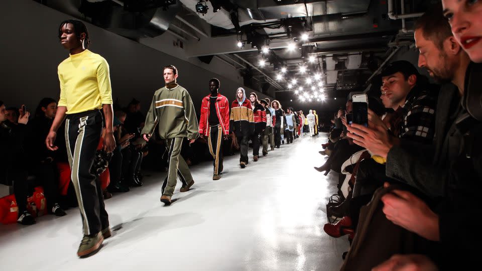 Models walk the runway at the end of the show at the Telfar Presentation during February 2017 New York Fashion Week. Telfar is known for its unisex clothing styles. - Gonzalo Marroquin/Patrick McMullan/Getty Images