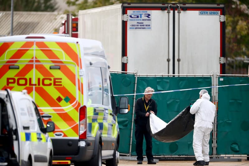 The scene where bodies were discovered in a lorry container, in Grays, Essex