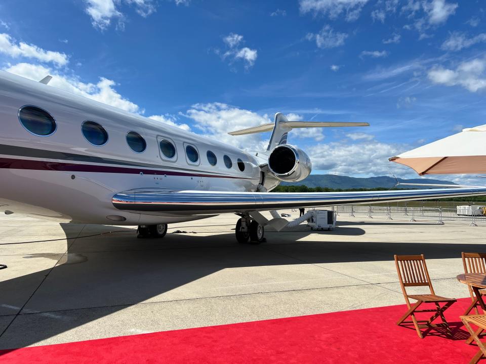 A three-quarter side view of a Gulfstream G700 at EBACE in Geneva 2024