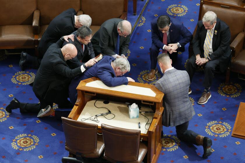 WASHINGTON, DC - JANUARY 06: Members-elect pray together in the House Chamber during the fourth day of elections for Speaker of the House at the U.S. Capitol Building on January 06, 2023 in Washington, DC. The House of Representatives is meeting to vote for the next Speaker after House Republican Leader Kevin McCarthy (R-CA) failed to earn more than 218 votes on several ballots; the first time in 100 years that the Speaker was not elected on the first ballot. (Photo by Anna Moneymaker/Getty Images)