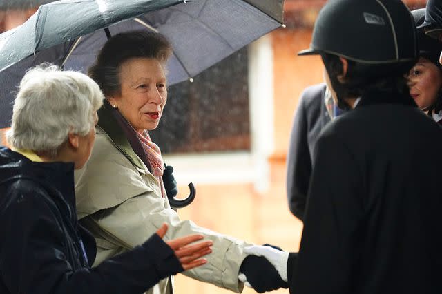 <p>James manning - WPA Pool/Getty Images</p> Princess Anne visits the Wormwood Scrubs Pony Centre on February 8 in London.