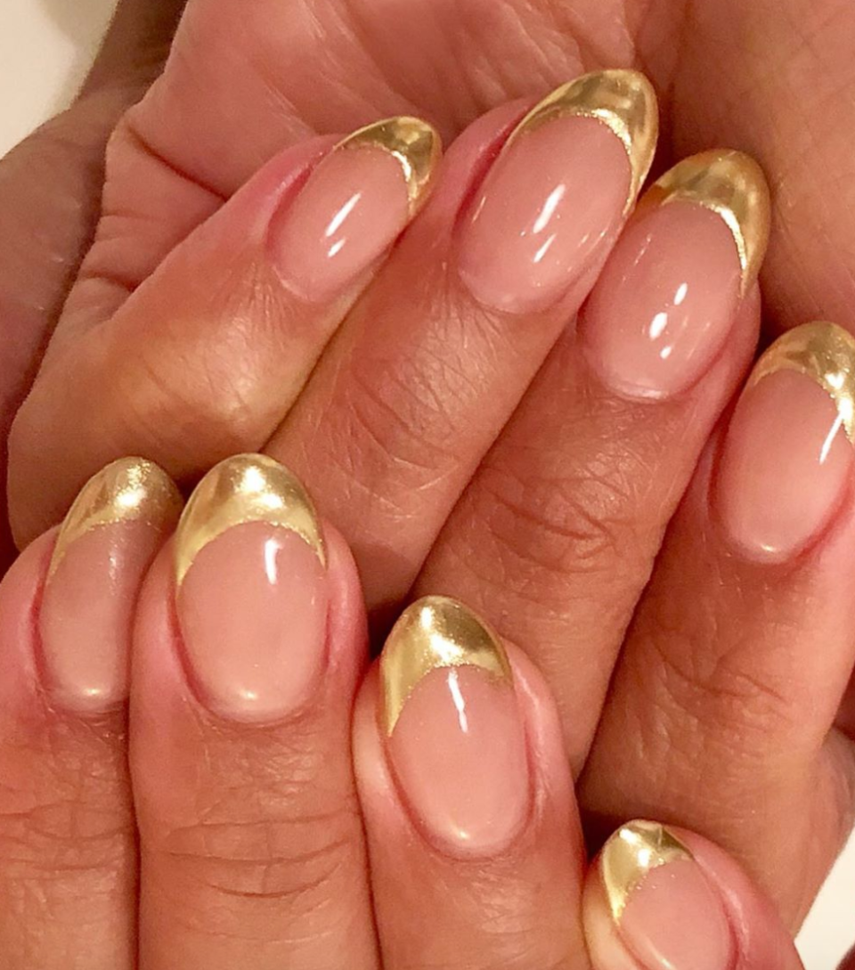 Gold tips make a French feel way more luxe, and a sophisticated gold looks a bit more modern than classic white.