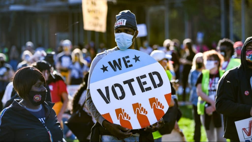 A view of voting rights signs as people gather during the Count Every Vote Rally In Philadelphia at Independence Hall on November 07, 2020 in Philadelphia, Pennsylvania. (Photo by Bryan Bedder/Getty Images for MoveOn)