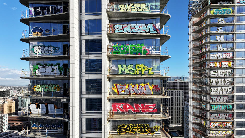 27 floors of unfinished L.A. luxury skyscraper tagged with graffiti.