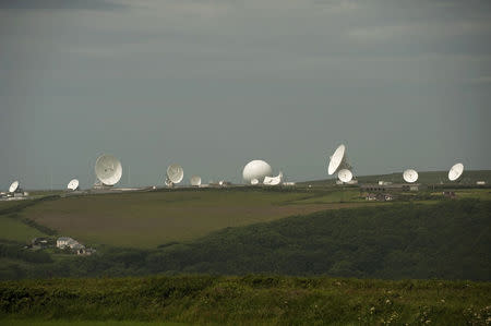 Satellite dishes are seen at GCHQ's outpost at Bude, close to where trans-Atlantic fibre-optic cables come ashore in Cornwall, southwest England in this file photograph dated June 23, 2013. REUTERS/Kieran Doherty/files