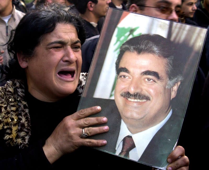Lebanese woman mourns assassination of former prime minister Rafik al-Hariri during a protest in Beirut