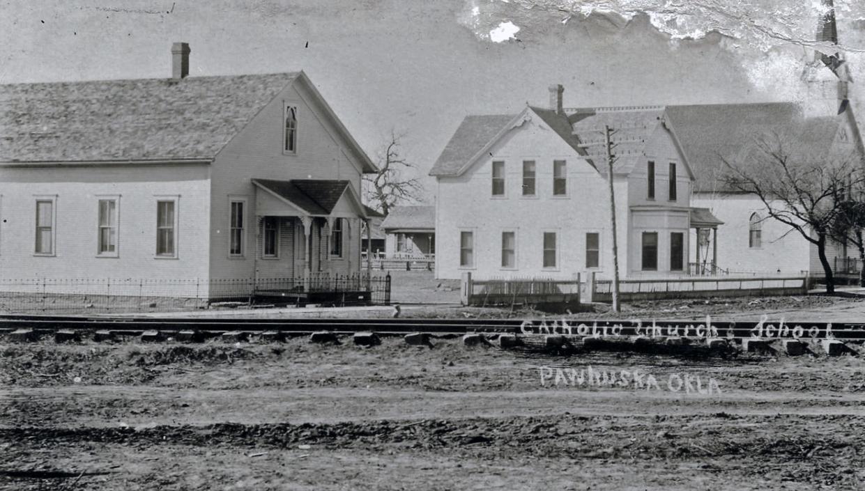 The St. Louis Church and School in Pawhuska, Oklahoma, is shown in this photograph. The St. Louis Boarding School for Girls was run by the Sisters of St. Francis, Sisters of Loretto and Sisters of the Blessed Sacrament at different times from 1887 to 1949.