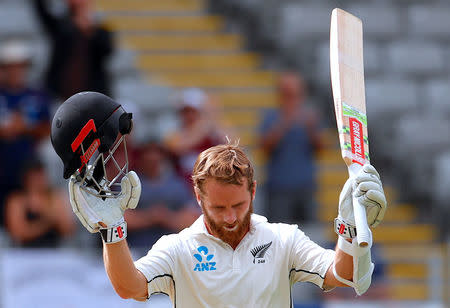 Cricket - Test Match - New Zealand v England - Eden Park, Auckland, New Zealand, March 23, 2018. New Zealand's captain Kane Williamson celebrates reaching his century during the second day of the first cricket test match. REUTERS/David Gray