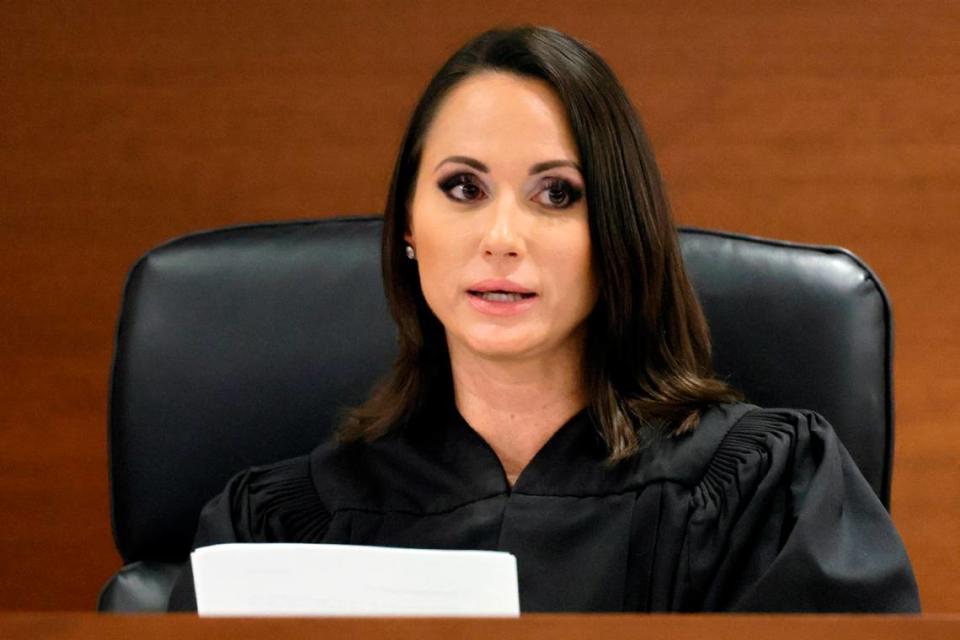 Judge Elizabeth Scherer reads the verdict in the trial of Marjory Stoneman Douglas High School shooter Nikolas Cruz at the Broward County Courthouse in Fort Lauderdale on Thursday, Oct. 13, 2022. Cruz, who plead guilty to 17 counts of premeditated murder in the 2018 shootings, is the most lethal mass shooter to stand trial in the U.S. He was previously sentenced to 17 consecutive life sentences without the possibility of parole for 17 additional counts of attempted murder for the students he injured that day. (Amy Beth Bennett/South Florida Sun Sentinel via AP, Pool)