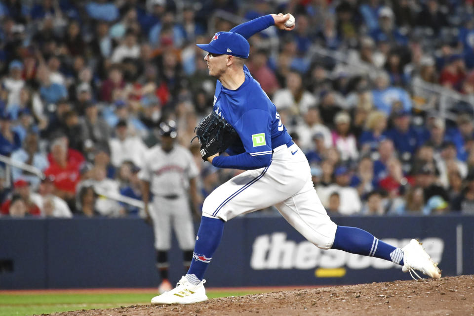 Toronto Blue Jays pitcher Chad Green (57) works against the Houston Astros during the ninth inning of a baseball game, Tuesday, July 2, 2024, in Toronto. (Jon Blacker/The Canadian Press via AP)