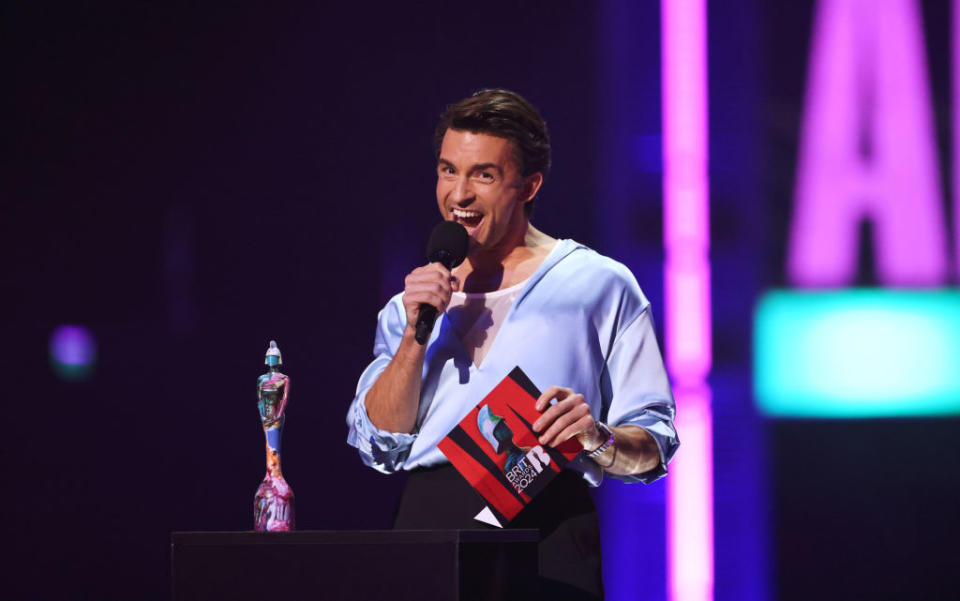 Jonathan Bailey presented Raye with the Artist of the Year award at the 2024 BRITs.<span class="copyright">Max Cisotti/Dave Benett—Getty Images</span>
