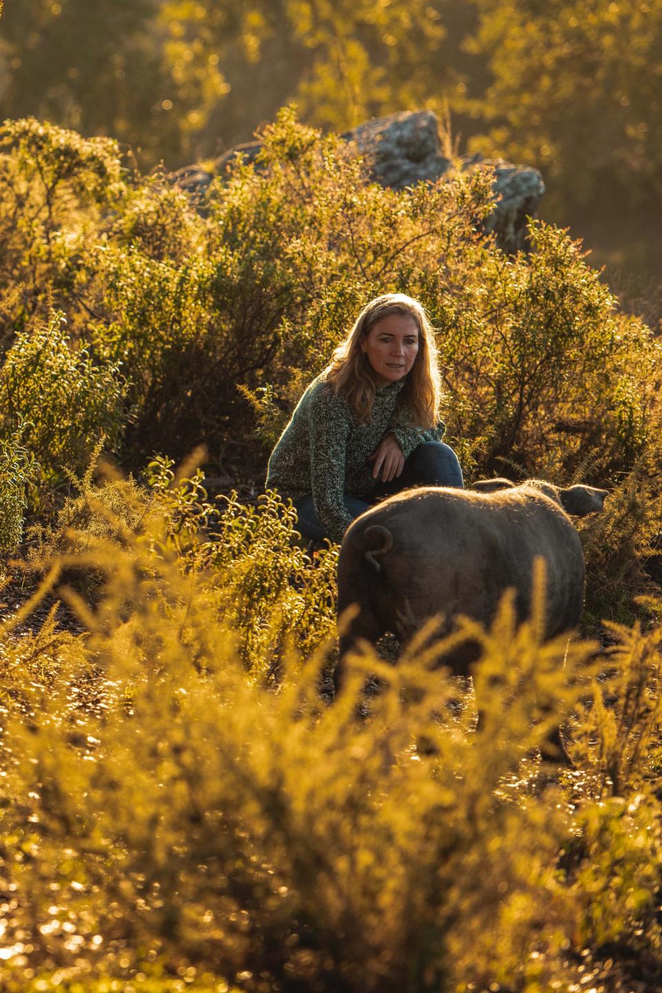 Rosa González Nieto runs the pig farm she inherited from her grandfather in southern Spain.