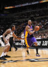 Kobe Bryant #24 of the Los Angeles Lakers drives against Kawhi Leonard #2 of the San Antonio Spurs on April 20, 2012 at the AT&T Center in San Antonio, Texas. (D. Clarke Evans/NBAE via Getty Images)