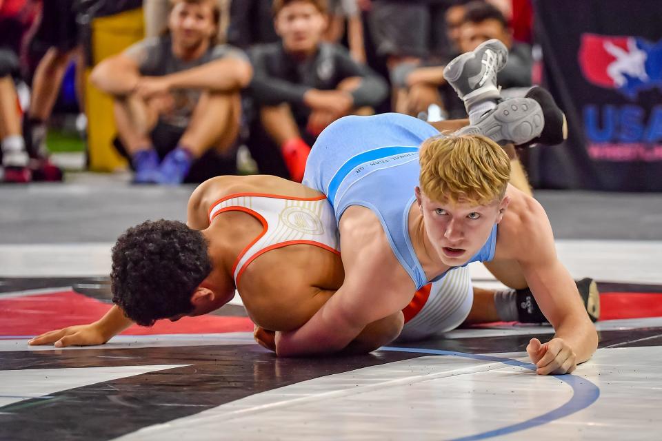 Wadsworth's Jaxon Joy, top, knows the key to a successful Fargo Junior National Freestyle tournament is to keep a sound mind.