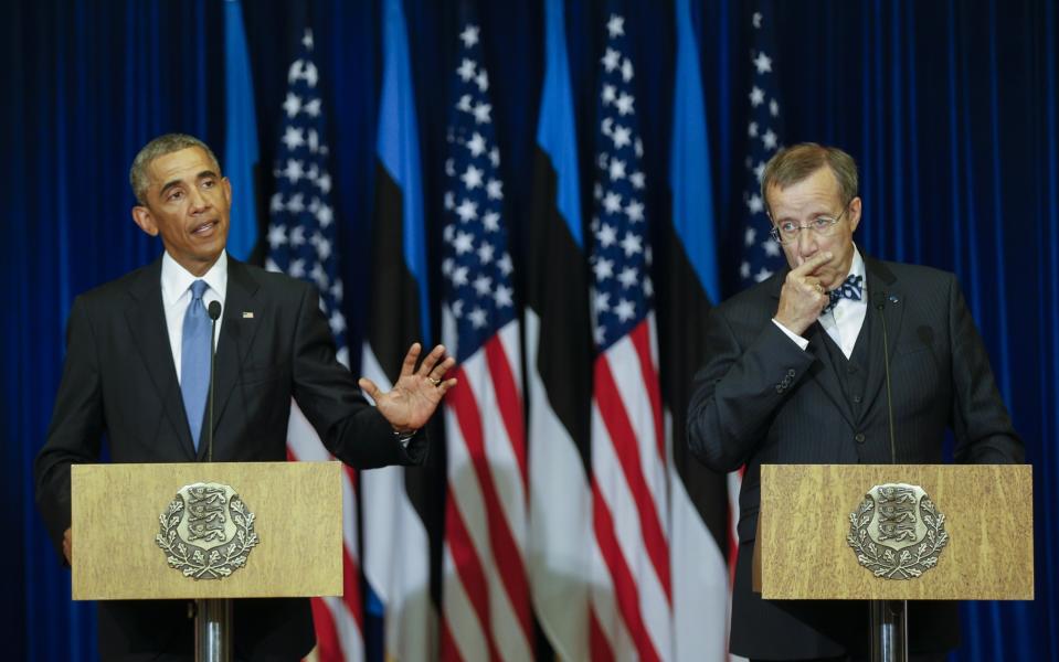 President Barack Obama, left, speaks as Estonian President Toomas Hendrik listens to him during a news conference at the Bank of Estonia in Tallinn, Estonia on Sept. 3, 2014. (Photo: Mindaugas Kulbis/AP)