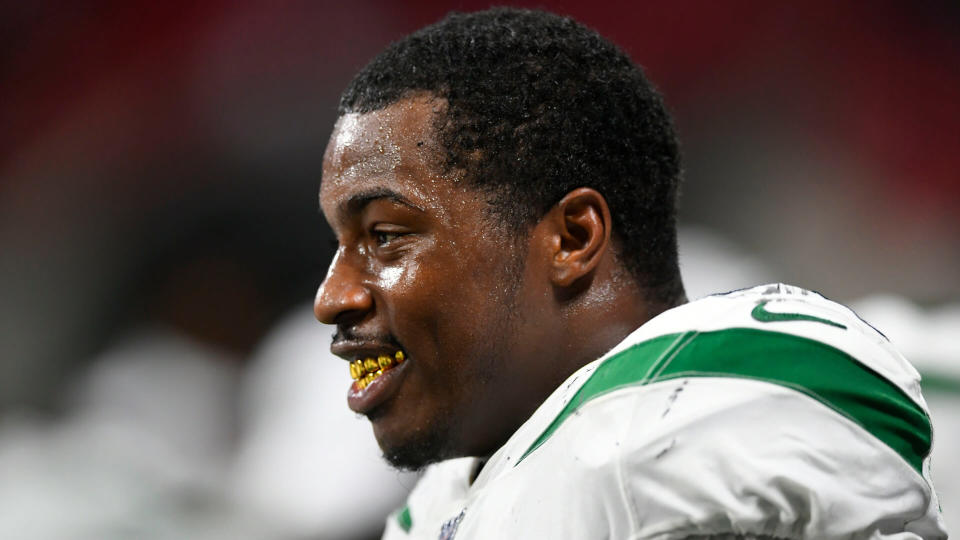 Mandatory Credit: Photo by John Amis/AP/Shutterstock (10362894cp)New York Jets outside linebacker James Burgess (58) sits on the bench during the second half an NFL preseason football game against the Atlanta Falcons, in AtlantaJets Falcons Football, Atlanta, USA - 15 Aug 2019.