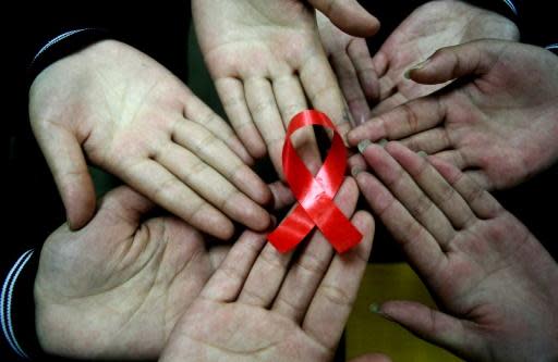 Global HIV meeting urges US to 'stay engaged' on AIDS funding