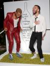 <p>Nicholas Ashe and Justice Smith get in on the grape-stomping fun at Ruinart and David Shrigley's Unconventional Bubbles exhibition on Nov. 30 in Miami.</p>