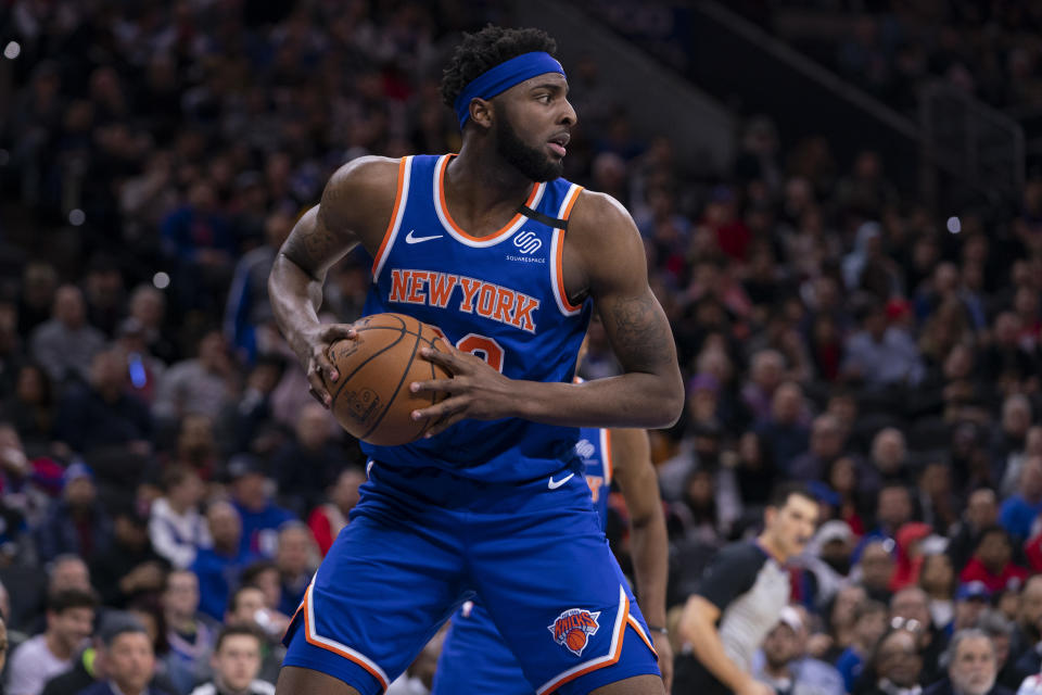 Mitchell Robinson #23 of the New York Knicks controls the ball against the Philadelphia 76ers at the Wells Fargo Center on February 27, 2020 in Philadelphia, Pennsylvania. NOTE TO USER: User expressly acknowledges and agrees that, by downloading and/or using this photograph, user is consenting to the terms and conditions of the Getty Images License Agreement. (Photo by Mitchell Leff/Getty Images)