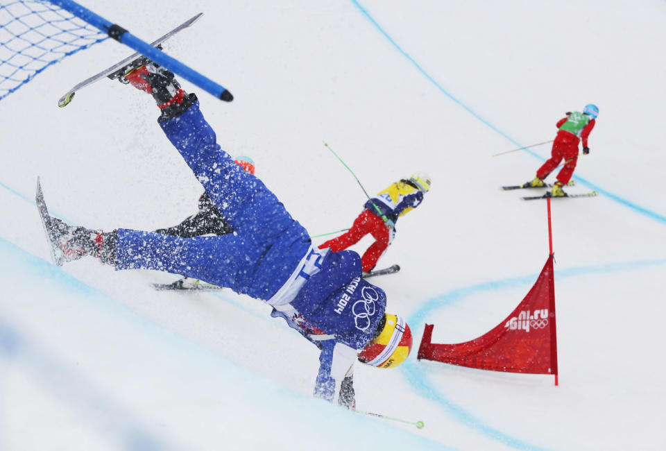 Russia's Anastasia Chirtcova crashes during a women's ski cross heat at the Rosa Khutor Extreme Park, at the 2014 Winter Olympics, Feb. 21, 2014, in Krasnaya Polyana, Russia. 