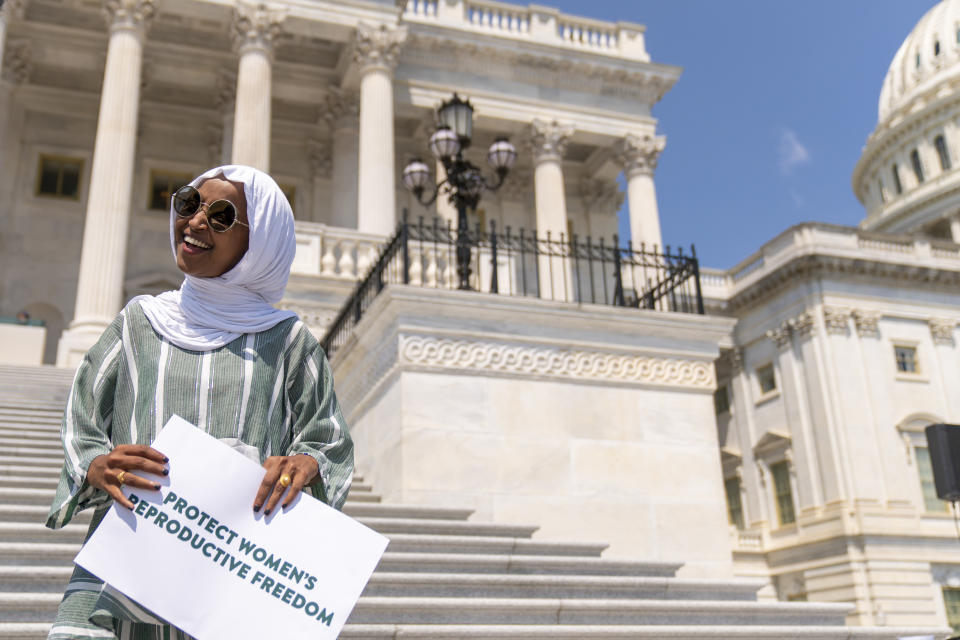 FILE - Rep. Ilhan Omar, D-Minn., joins female House Democrats at an event ahead of a House vote on the Women's Health Protection Act and the Ensuring Women's Right to Reproductive Freedom Act at the Capitol in Washington on July 15, 2022. (AP Photo/Andrew Harnik, File)