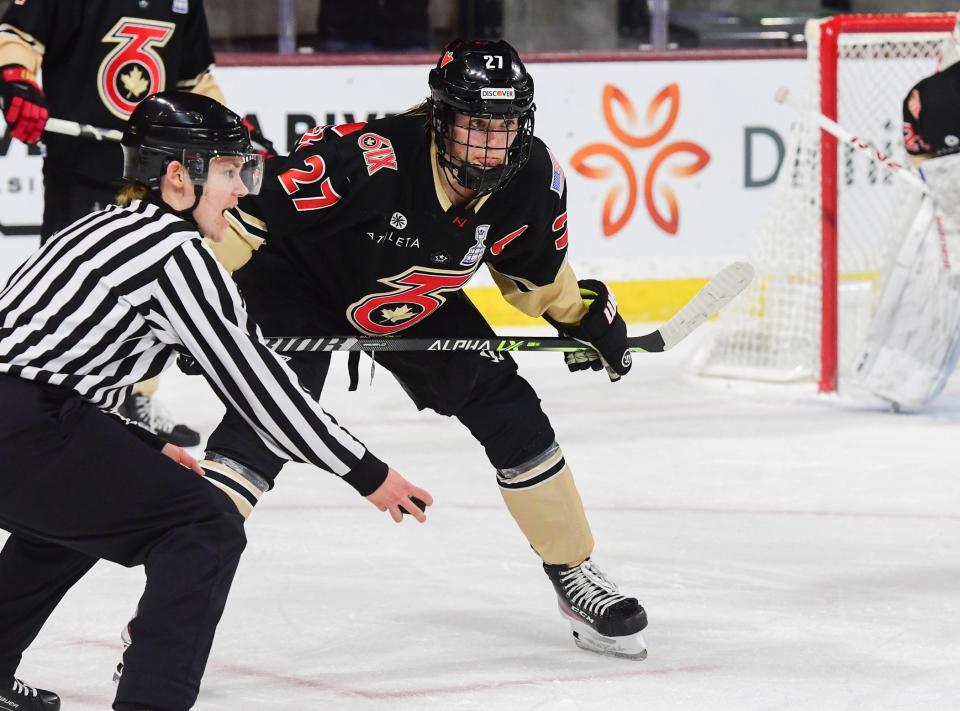 Brighton native Shiann Darkangelo of the Toronto Six prepares to take a faceoff during the Isobel Cup championship game against the Minnesota Whitecaps on Sunday, March 26, 2023 in Tempe, Ariz.