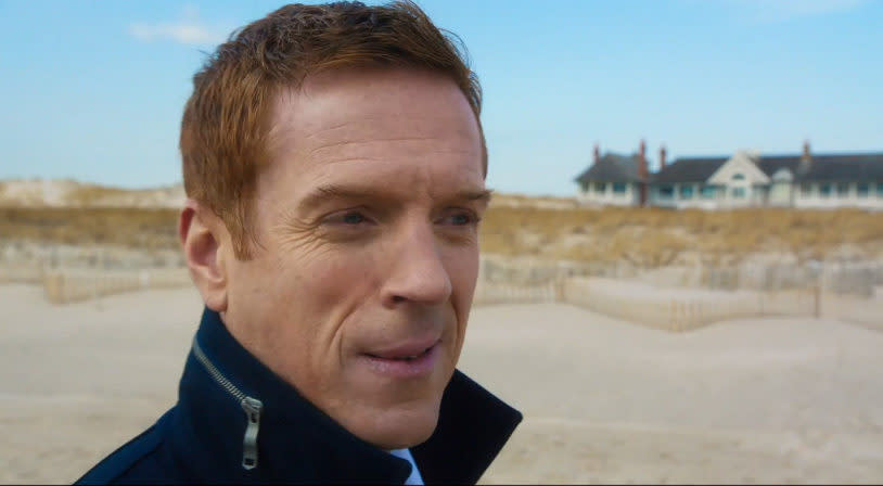 Axelrod (Damian Lewis) in front of the Hamptons mansion. 