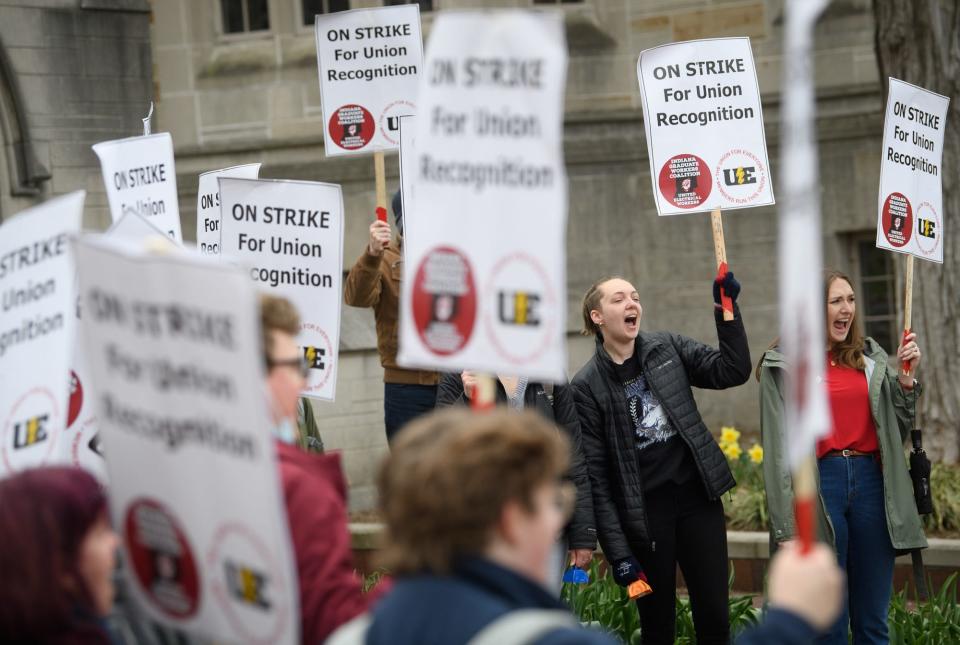 Annelies Stoelinga pickets with other supporters of the graduate workers strike at the Sample Gates on Wednesday, April 20, 2022. 