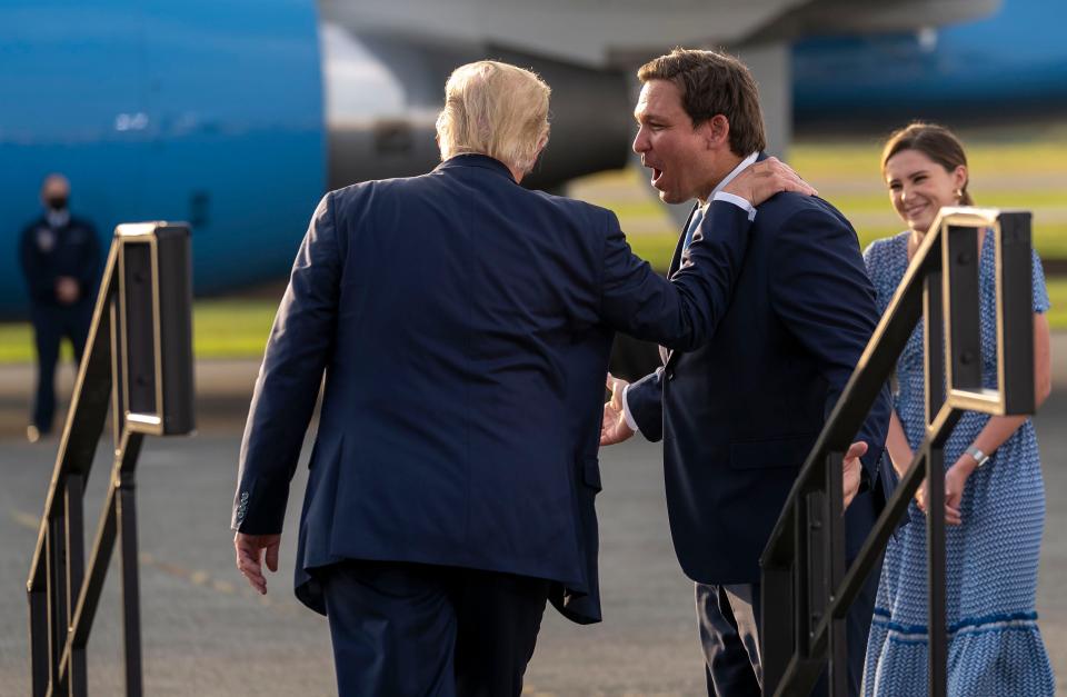 Happier times. Gov. Ron DeSantis and then-President Donald Trump at a campaign rally in Ocala, Fla., on Oct. 16, 2020.