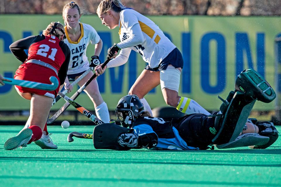 Cape Henlopen defends against an attempted goal by Smyrna senior Meghan Shirey (21) during the DIAA Division I field hockey championship game at the University of Delaware's Rullo Stadium in Newark, Saturday, Nov. 19, 2022. Smyrna won 2-1 in overtime.