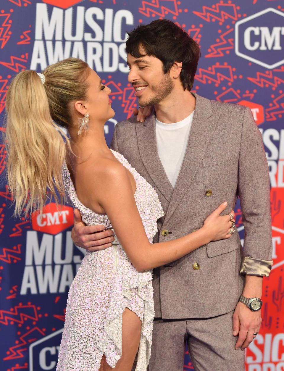 Kelsea Ballerini and Morgan Evans posing 