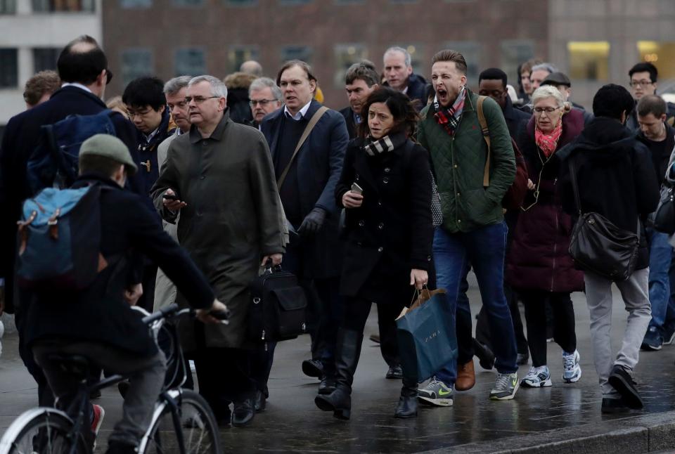 During the morning rush hour, people walk.