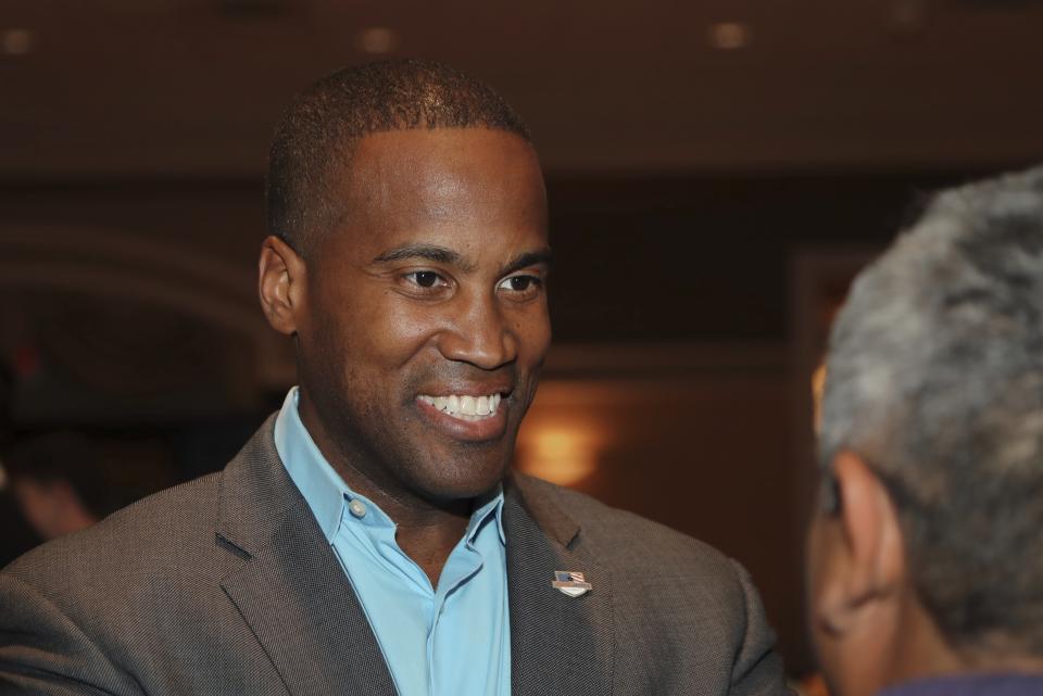 In a photo from Monday, July 16, 2018, Republican U.S. Senate candidate John E. James is seen during a campaign stop in Sterling Heights, Mich. Michigan Republicans' uphill bid to grab hold of a U.S. Senate seat for just the second time in 40 years starts with an increasingly testy primary between two Detroit-area businessmen who are trading barbs over Donald Trump and their own business records. James or Sandy Pensler, will advance to face third-term Sen. Debbie Stabenow. (AP Photo/Carlos Osorio)